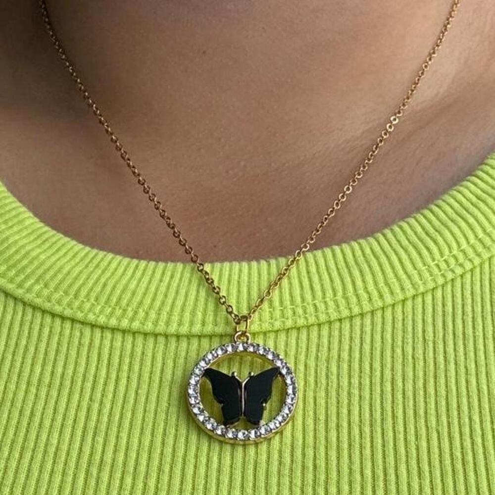 Black butterfly pendant necklace with
